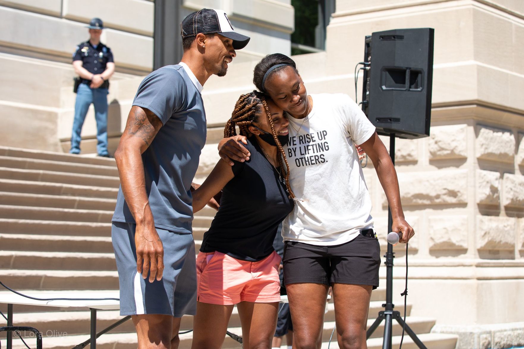 Former Pacer George Hill (L) and former Indiana Fever player Tamika Catchings (R) with friend